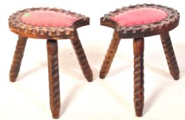 PAIR OF SPANISH HARDWOOD CARVED MILKING STOOLS