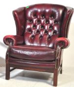 EARLY 20TH CENTURY RED LEATHER CHESTERFIELD ARMCHAIR