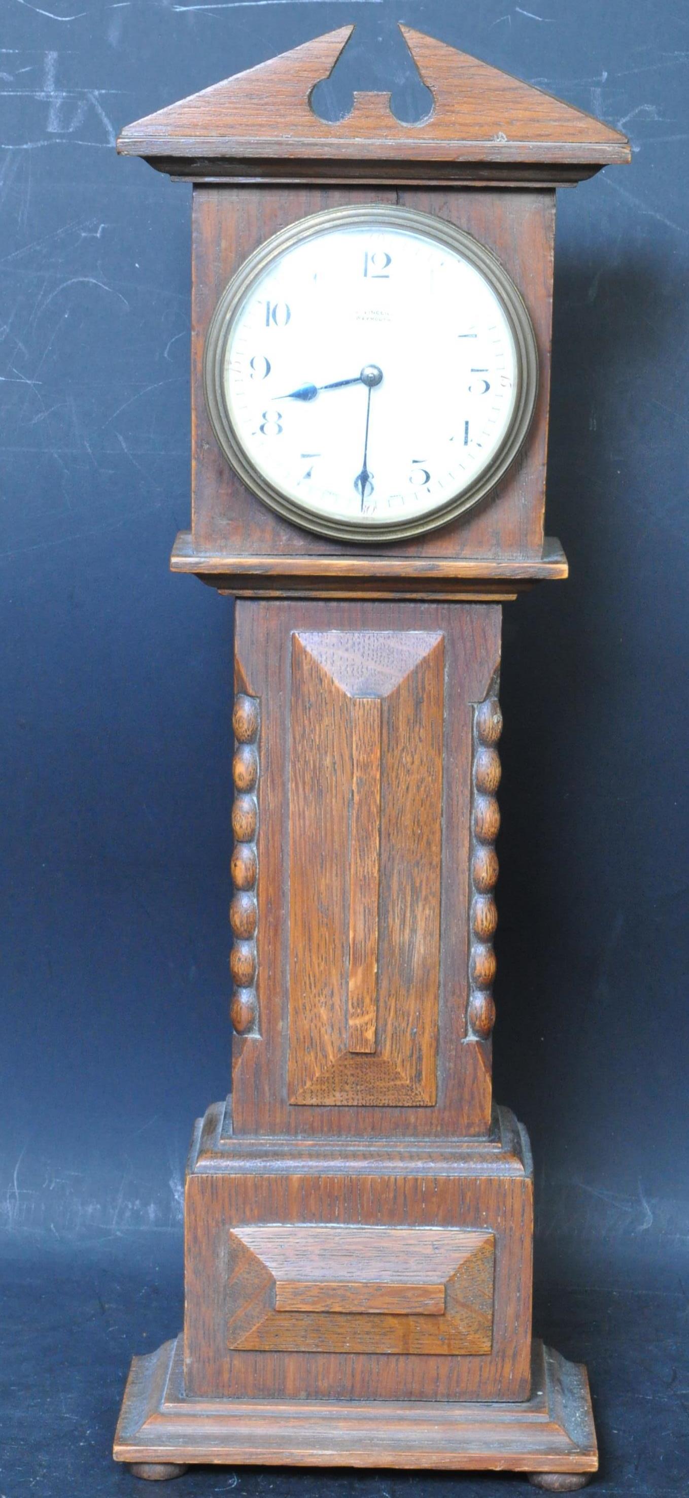 EARLY 20TH CENTURY J. VINCENT MINAITURE LONGCASE DESK CLOCK