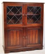 20TH CENTURY JACOBEAN REVIVAL BOOKCASE CABINET