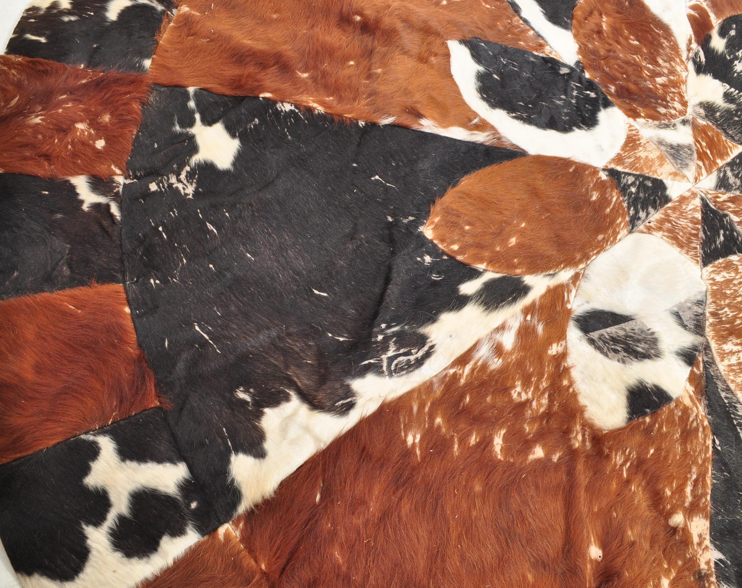 RETRO VINTAGE 20TH CENTURY CIRCA 1970S PATCH WORK COW HIDE RUG - Image 5 of 8