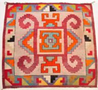 A VINTAGE SOUTH AMERICAN KILIM STYLE NAVAJO FLOOR RUG