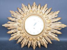 AN ART DECO 1930S SMITHS SUNBURST WALL CLOCK