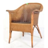 A RETRO VINTAGE MID 20TH CENTURY LLOYD LOOM TUB CHAIR