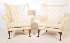 PAIR OF EARLY 20TH CENTURY WINGBACK ARMCHAIRS