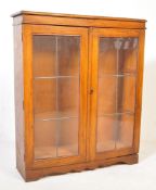 20TH CENTURY OAK AND LEADED GLASS BOOKCASE