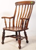 AN EARLY 19TH CENTURY BEECH AND ELM WINDSOR ARMCHAIR