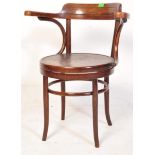 AN EARLY 20TH CENTURY THONET STYLE BENTWOOD ARMCHAIR