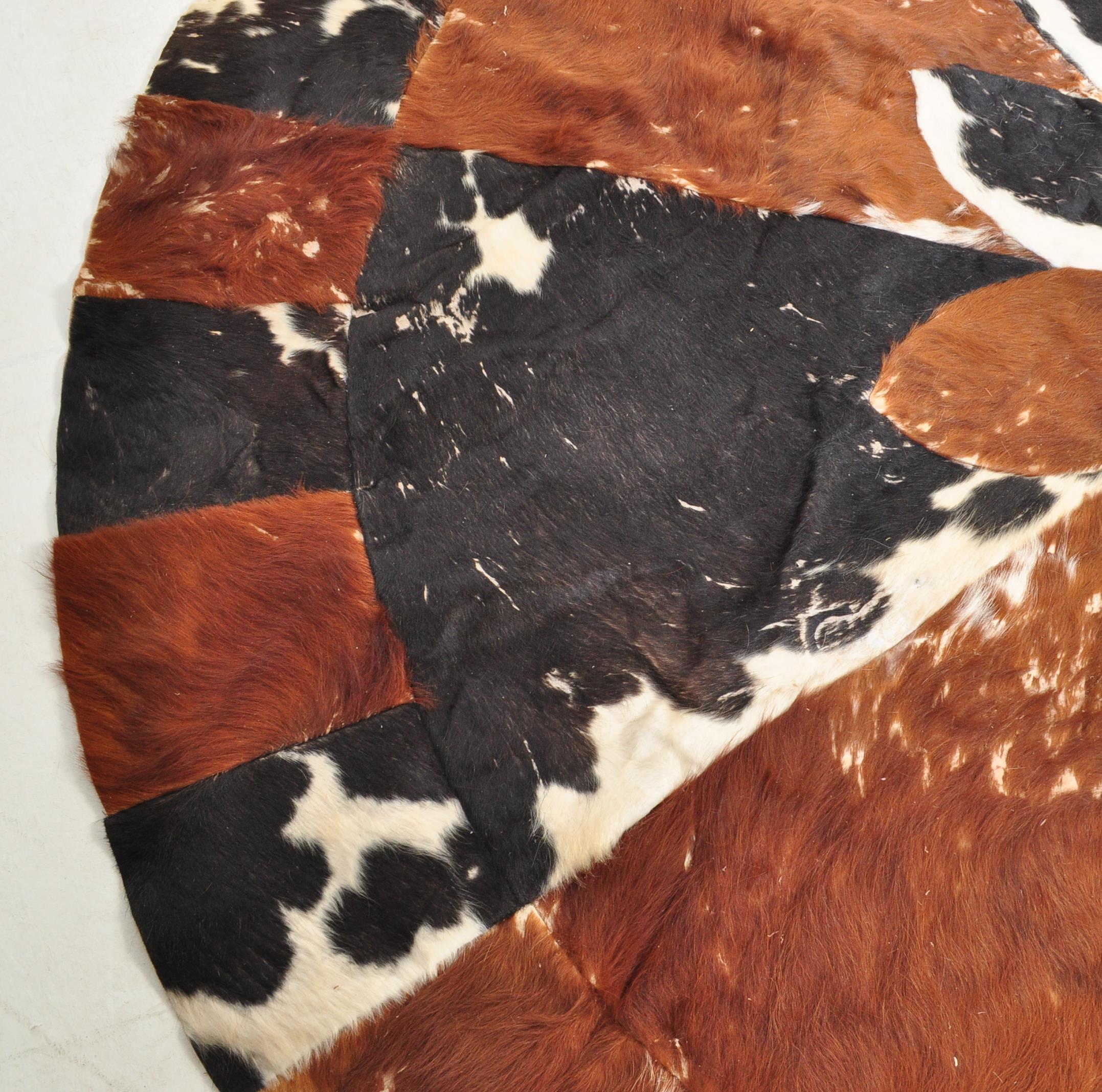 RETRO VINTAGE 20TH CENTURY CIRCA 1970S PATCH WORK COW HIDE RUG - Image 4 of 8