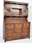 A JAYCEE JACOBEAN REVIVAL 20TH CENTURY OAK DRESSER