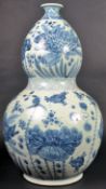 19TH CENTURY CHINESE BLUE AND WHITE DOUBLE GOURD VASE
