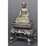 19TH CENTURY CHINESE MINIATURE BRONZE BUDDHA ON STAND