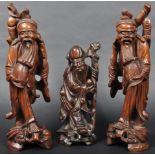 THREE CHINESE / ORIENTAL CARVED HARDWOOD ELDER / IMMORTAL FIGURES