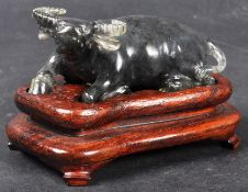 CHINESE BLACK JADE CARVED WATER BUFFALO ON STAND