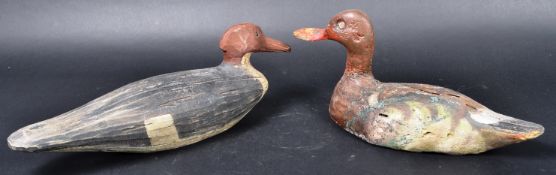 TWO EARLY 20TH CENTURY CARVED DECOY DUCKS