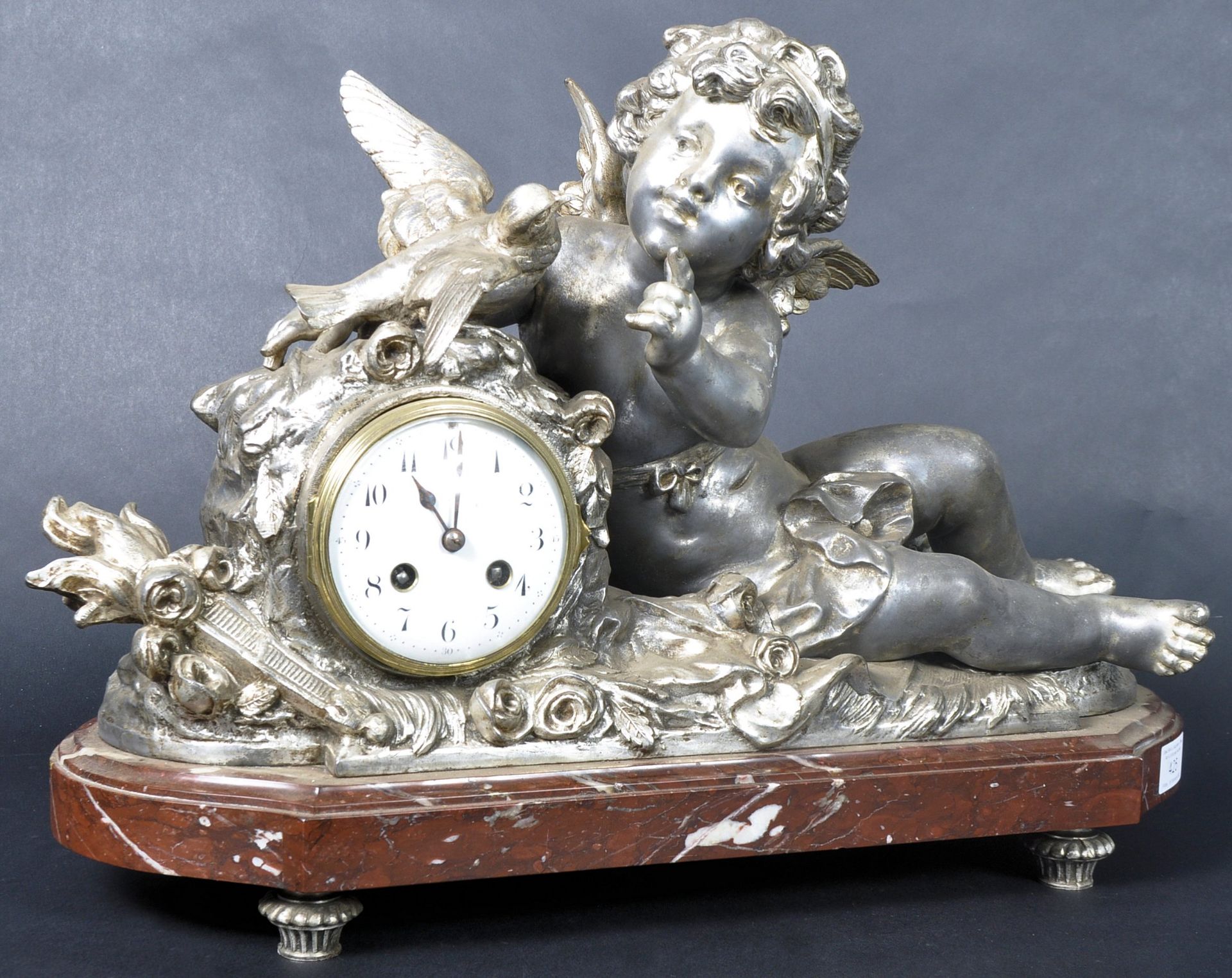 19TH CENTURY FRENCH CHERUB MANTEL CLOCK ON MARBLE BASE