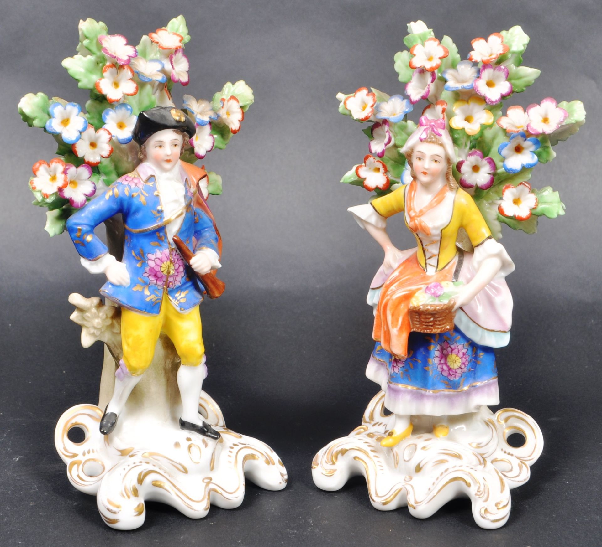 PAIR OF 19TH CENTURY CHELSEA MANNER PORCELAIN FIGURES