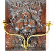 19TH CENTURY CARVED WOODEN PANEL WITH BRASS CANDLE SCONCES