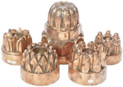 COLLECTION OF LARGE VICTORIAN COPPER JELLY MOULDS