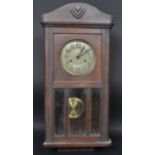 EARLY 20TH CENTURY MAHOGANY CASED WALL CLOCK