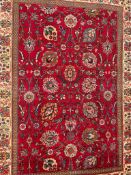 AN EARLY 20TH CENTURY HAND KNOTTED PERSIAN TABRIZ FLOOR RUG