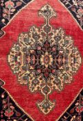 AN EARLY 20TH CENTURY HAND KNOTTED PERSIAN BAKHTIAR RUG