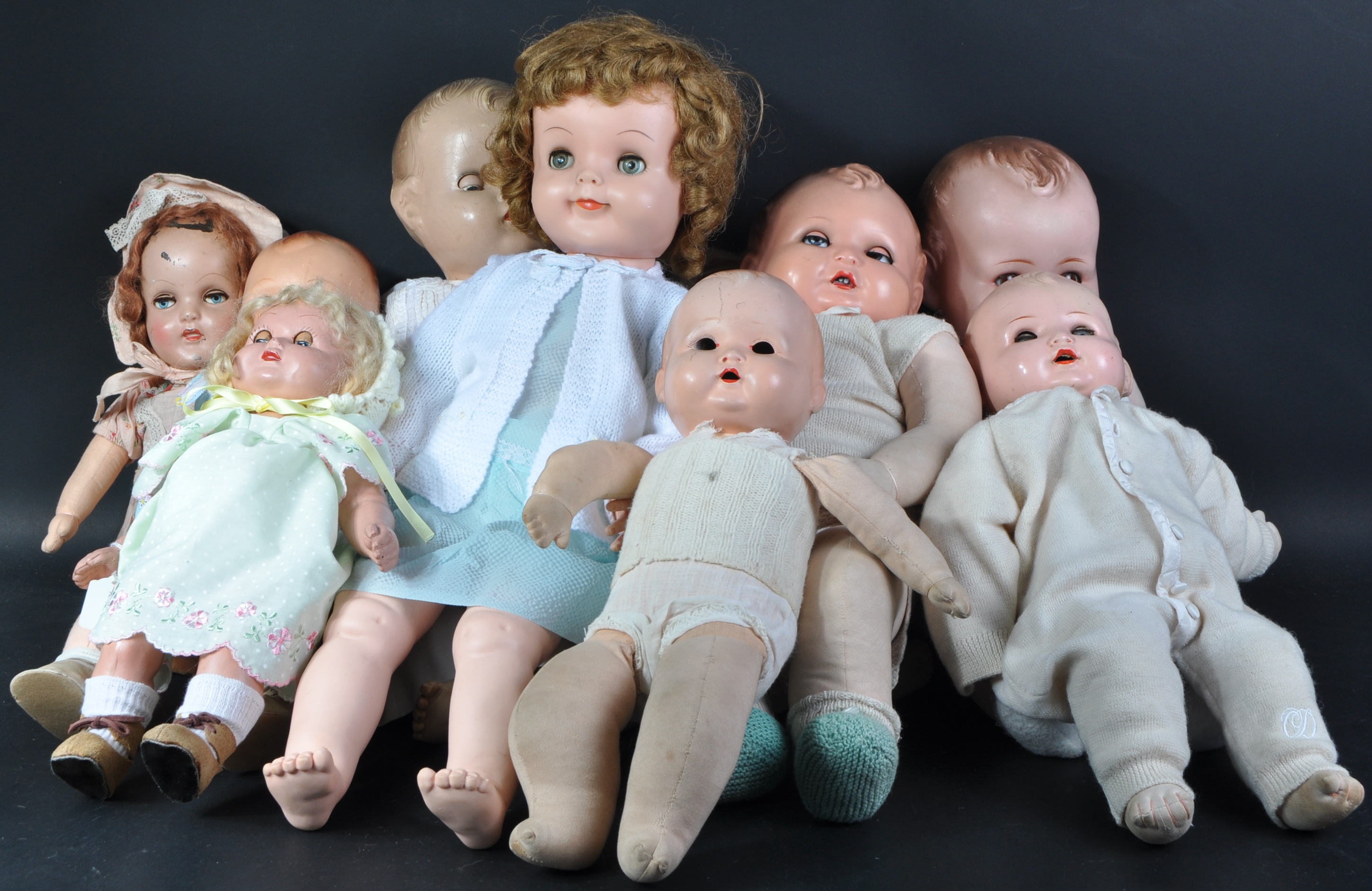 COLLECTION OF X12 VINTAGE BISQUE HEADED DOLLS