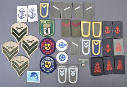 LARGE COLLECTION OF ASSORTED BRITISH NAVY UNIFORM CLOTH PATCHES