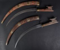 TWO EARLY 20TH CENTURY NORTH AFRICAN SWORDS