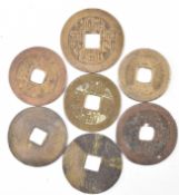 COLLECTION OF ELEVEN CHINESE ORIENTAL BRASS CASH COINS