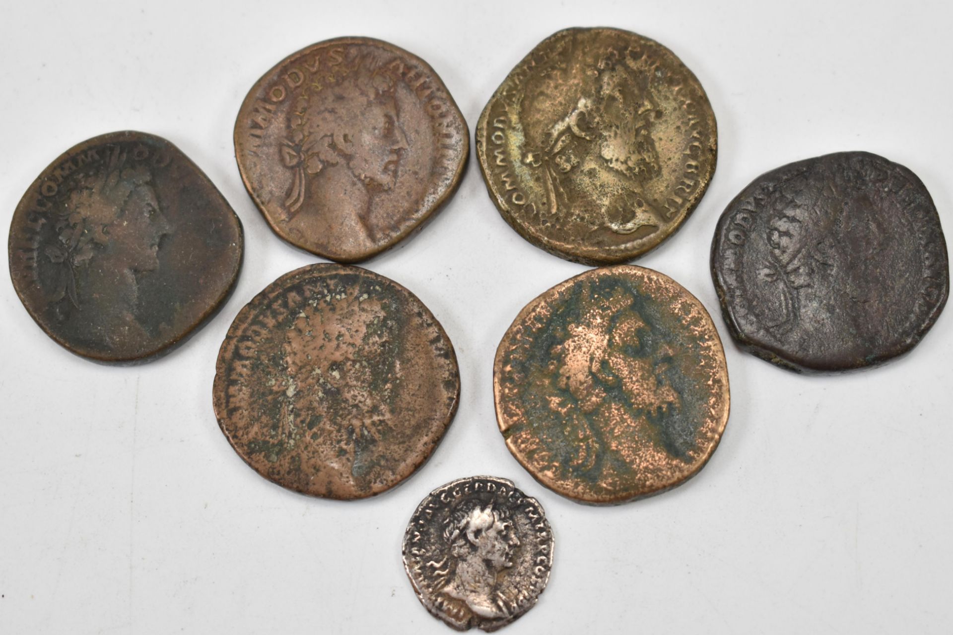 SEVEN ROMAN IMPERIAL COINS FROM THE REIGN OF COMMODUS