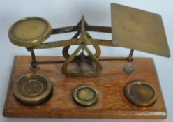 PAIR OF EARLY 20TH CENTURY BRASS APOTHECARY SCALES & WEIGHTS