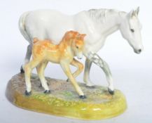 20TH CENTURY ROYAL DOULTON HAND PAINTED MARE AND FOAL GROUP