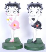 TWO VINTAGE BETTY BOOP CAST METAL DOORSTOPS