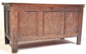 17TH CENTURY OAK COFFER WITH CARVED FRONT PANELS