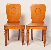 A PAIR OF 19TH CENTURY VICTORIAN OAK HALL CHAIRS