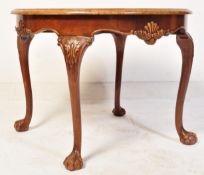 A QUEEN ANNE REVIVAL WALNUT ROUND COFFEE TABLE