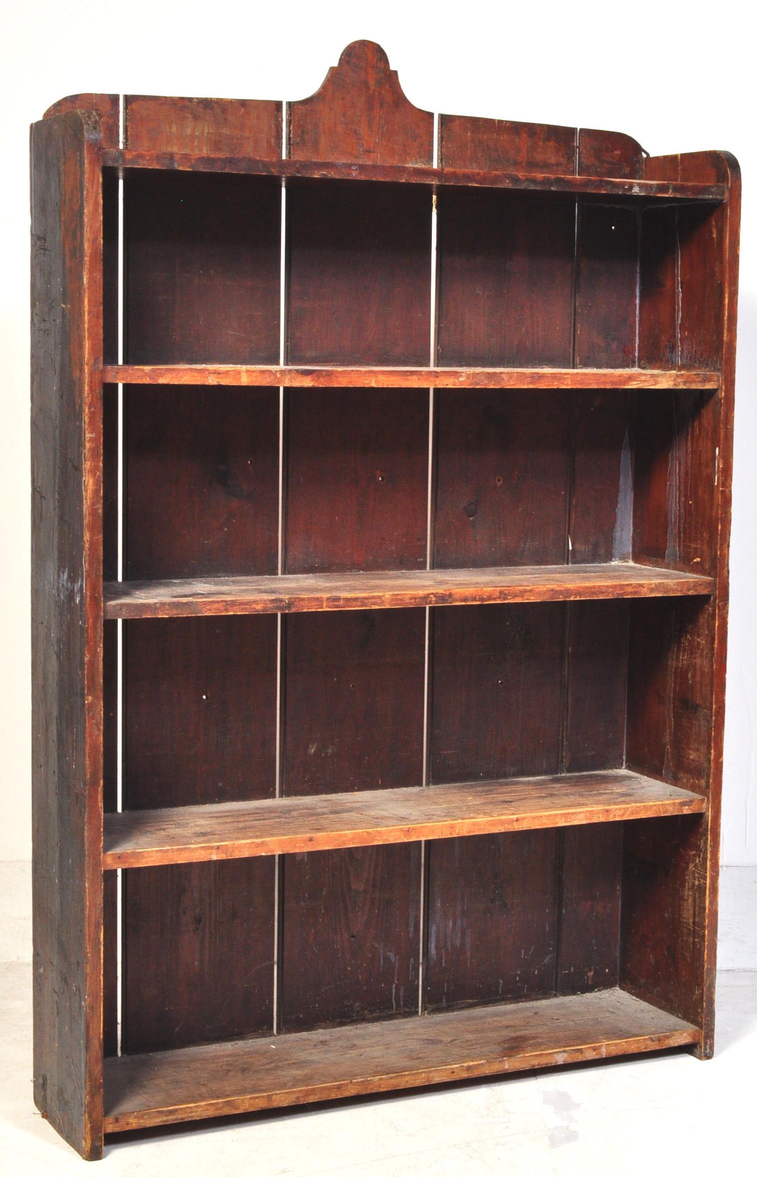 LATE VICTORIAN STAINED PINE OPEN WINDOW BOOKCASE