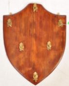 EARLY 20TH CENTURY MAHOGANY & BRASS ARMORIAL COAT RACK