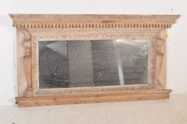 A VICTORIAN 19TH CENTURY OVERMANTEL PINE CARVED MIRROR