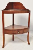 A 19TH CENTURY GEORGE III MAHOGANY CORNER WASHSTAND