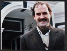 JOHN CLEESE - FAWLTY TOWERS - 11X14" AUTOGRAPHED PHOTO