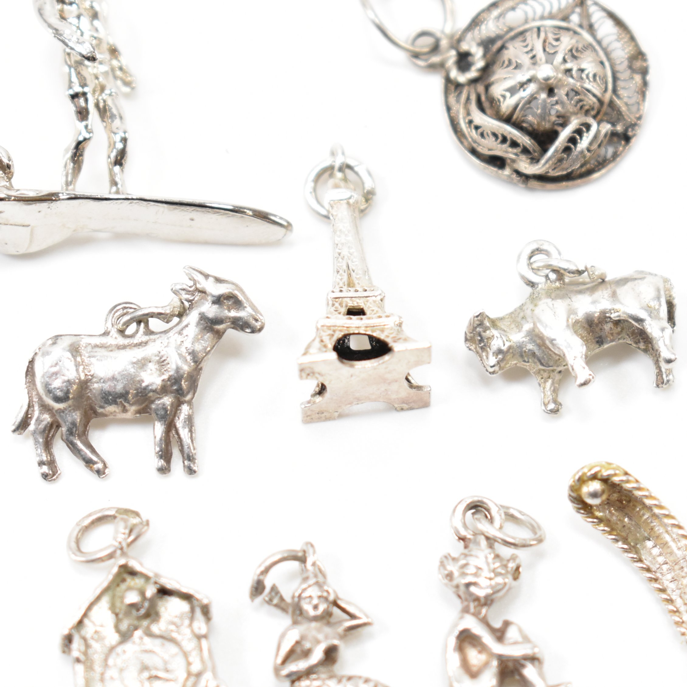 GROUP OF VINTAGE WHITE METAL CHARMS - Image 4 of 6
