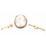 THREE 20TH CENTURY GOLD BROOCHES - CAMEO & BAR