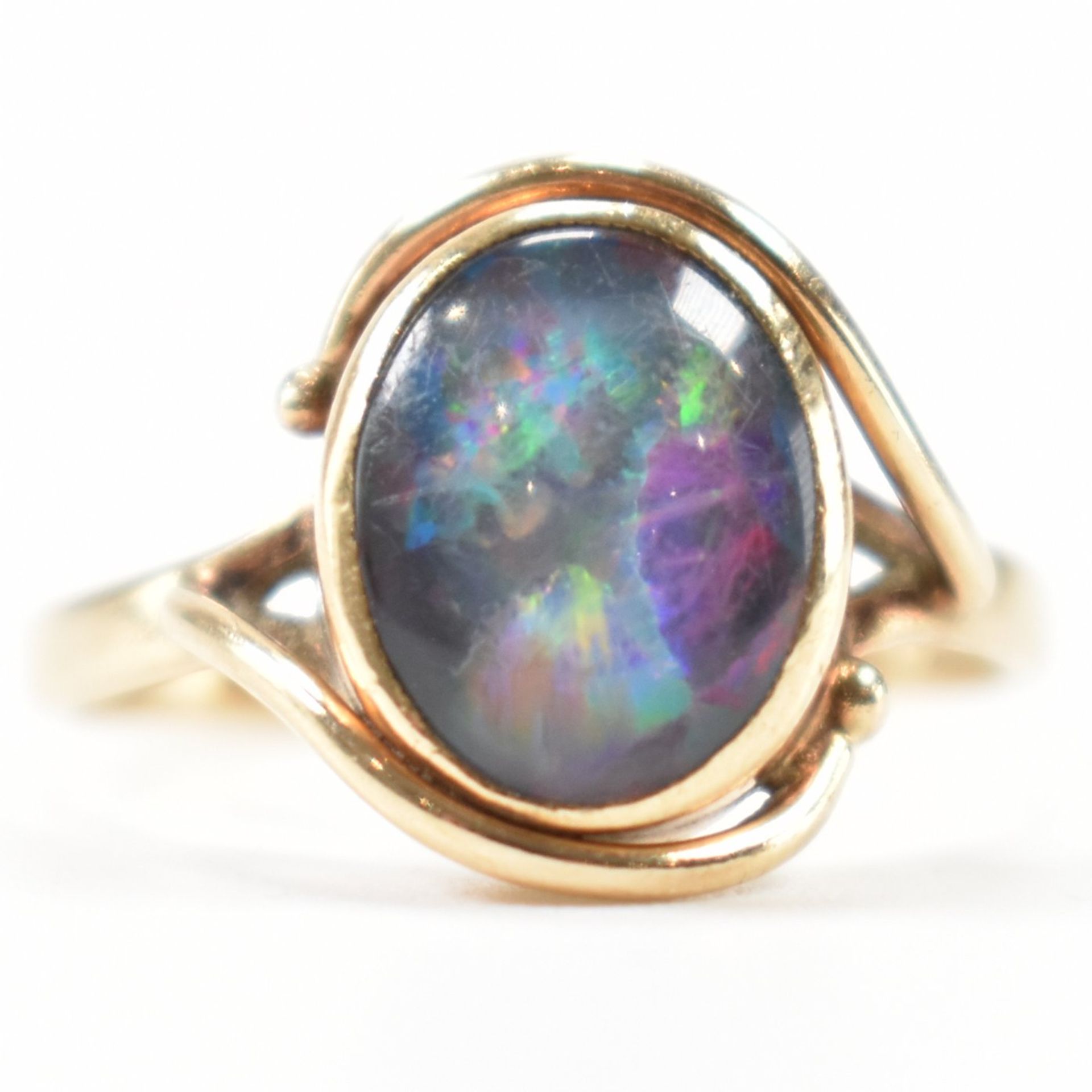 GOLD & SIMULATED OPAL CABOCHON CROSSOVER RING