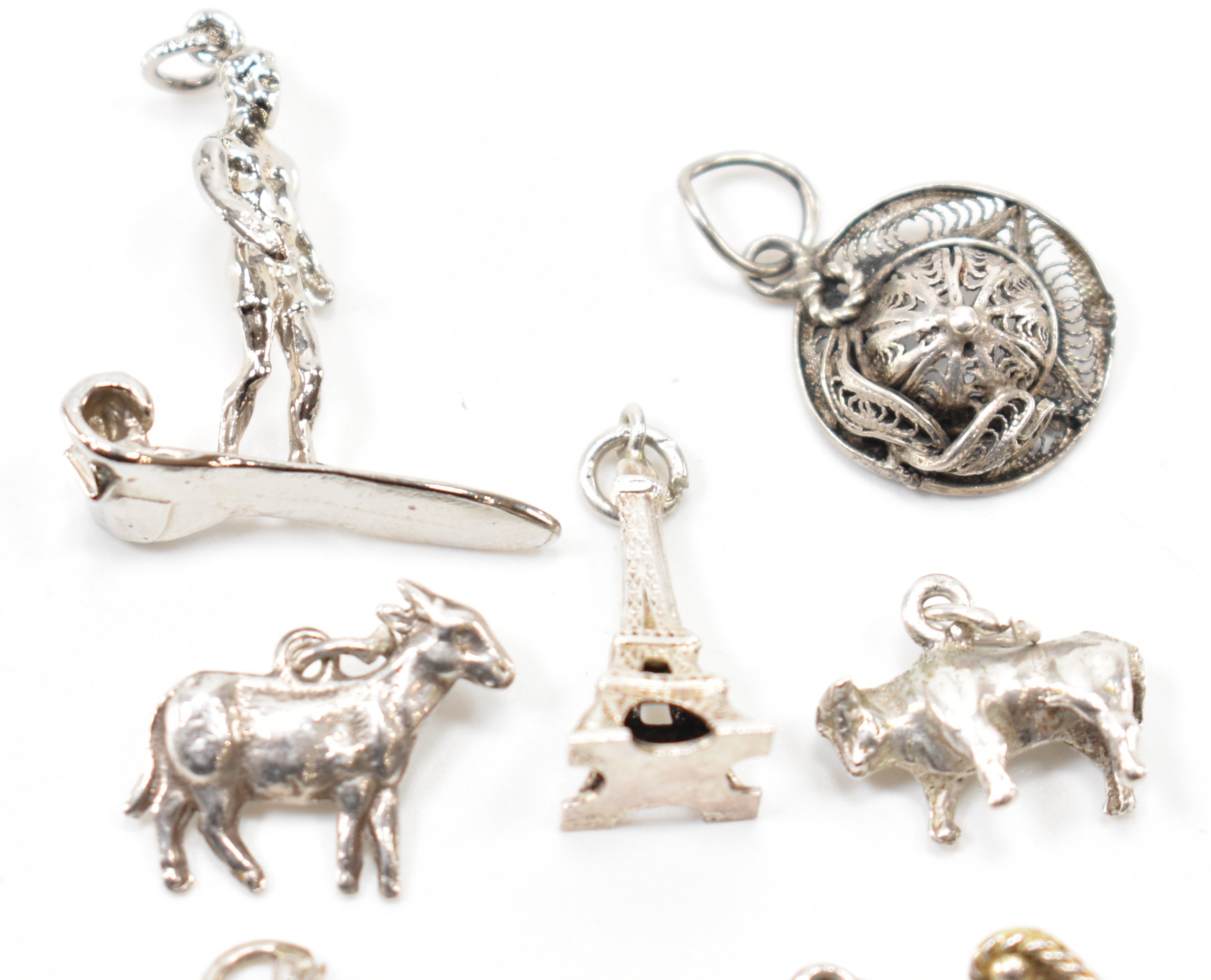 GROUP OF VINTAGE WHITE METAL CHARMS - Image 3 of 6