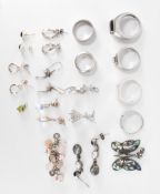 ASSORTMENT OF SILVER EARRINGS AND RINGS
