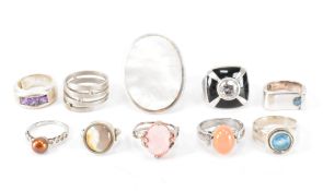 GROUP OF TEN SILVER STONE SET RINGS