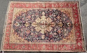 AN EARLY 20TH CENTURY HAND KNOTTED PERSIAN TABRIZ FLOOR RUG