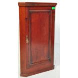 A 19TH CENTURY GEORGIAN MAHOGANY CORNER CUPBOARD / CABINET